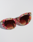 CALYPSO ~ Modern cateye sunglasses in a vibrant multicoloured acetate with crystal embellishments