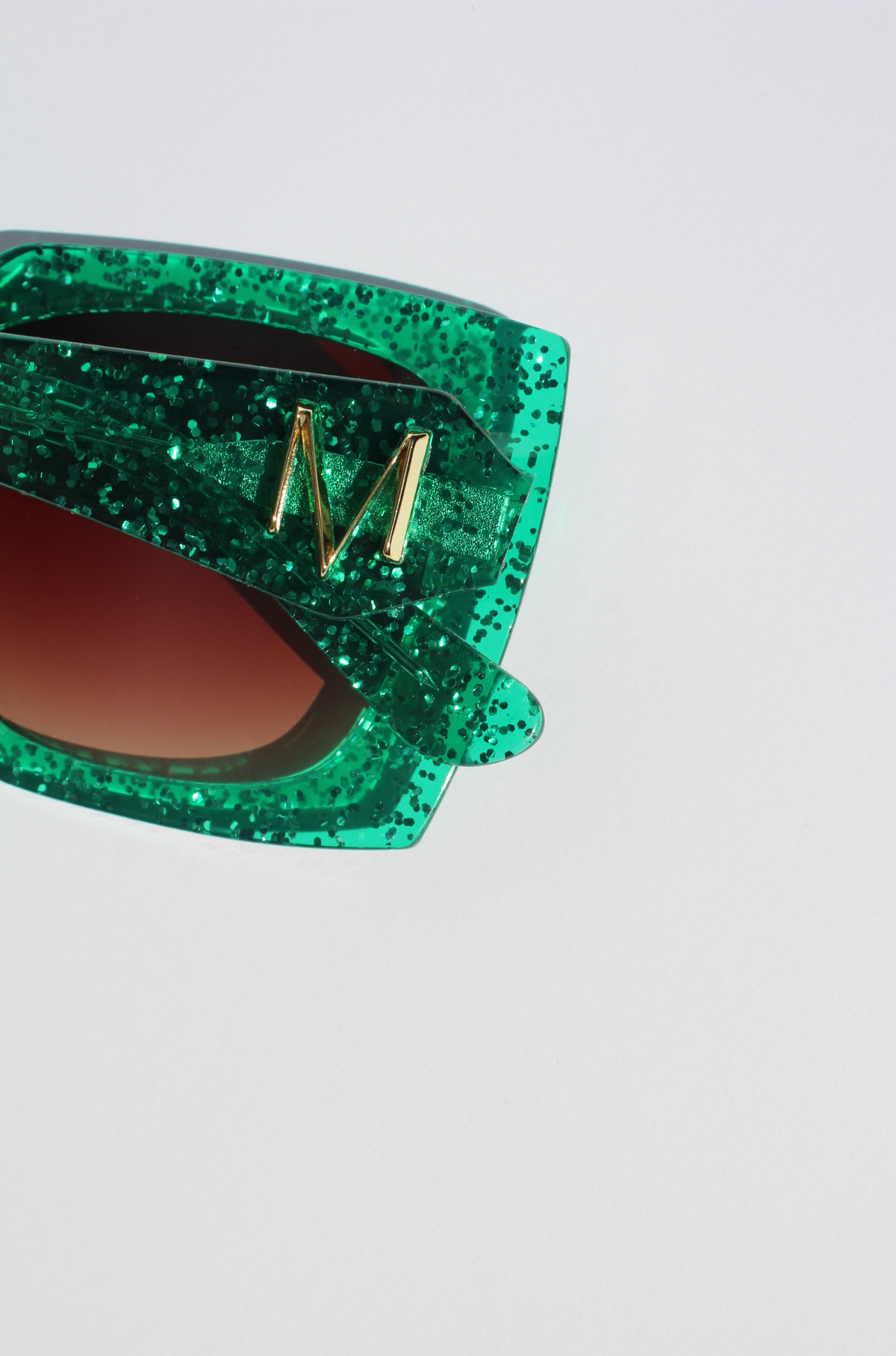 EMMARALDA ~ Square shaped sunglasses in shimmering glitter emerald green acetate