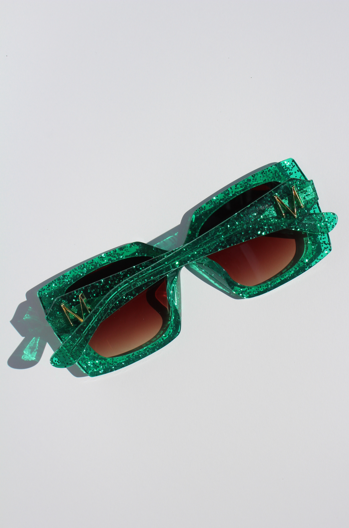 EMMARALDA ~ Square shaped sunglasses in shimmering glitter emerald green acetate