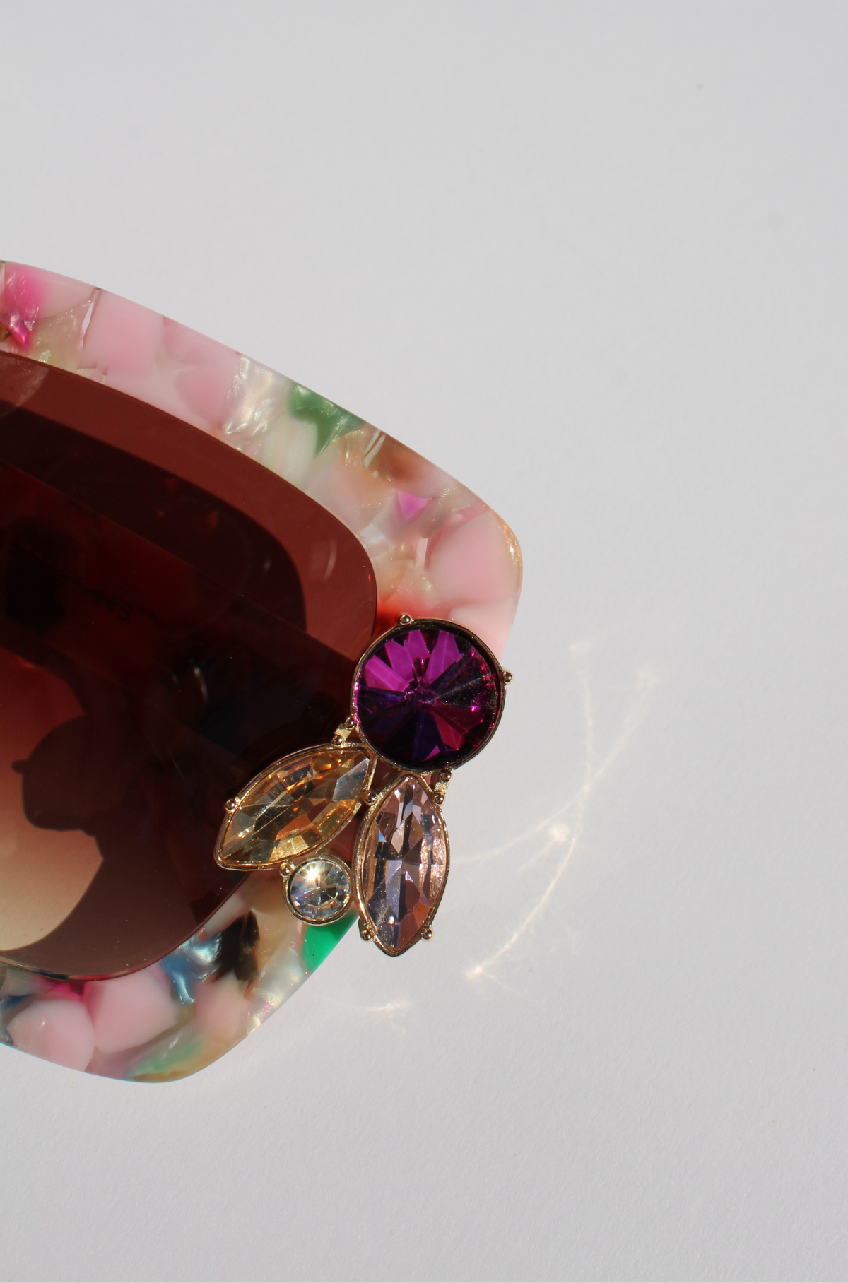 FUNFETTI ~ Oversized rounded square sunglasses in a multicoloured acetate with statement pink and honey crystals