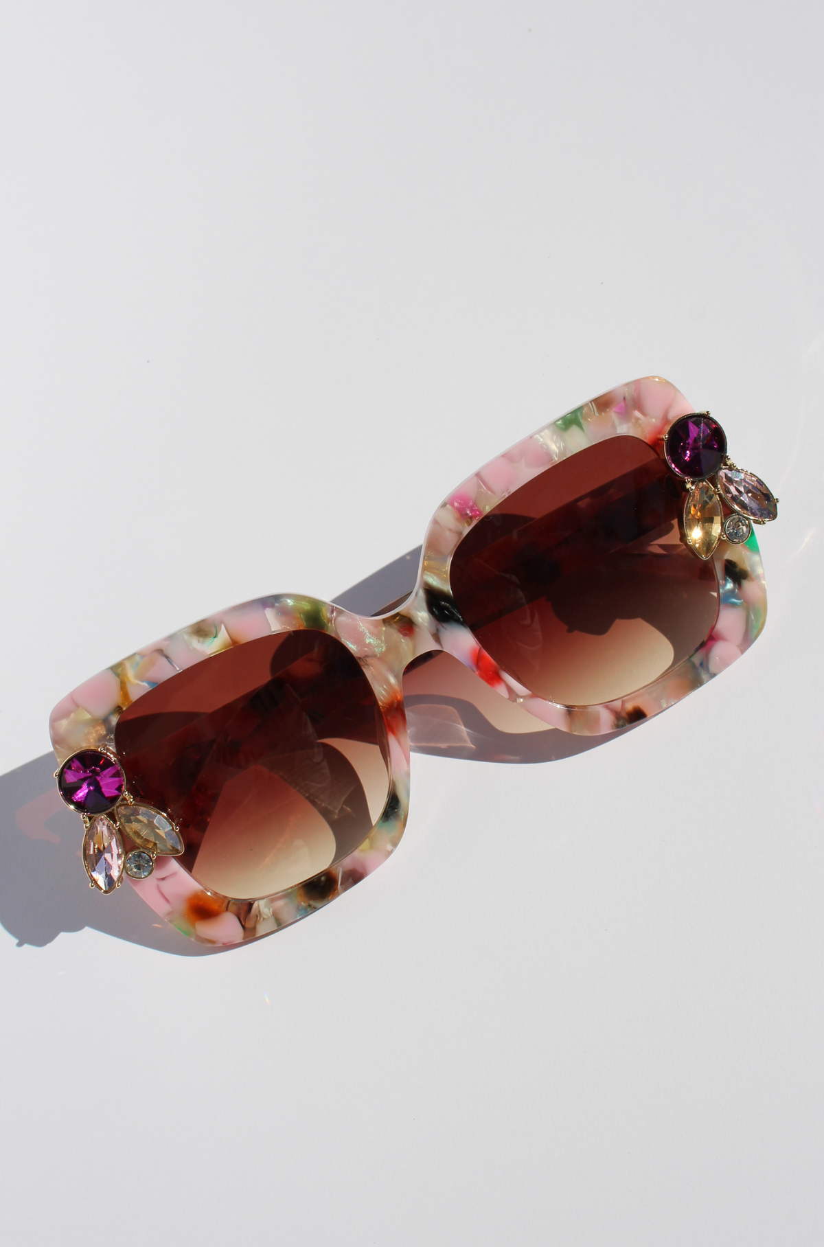 FUNFETTI ~ Oversized rounded square sunglasses in a multicoloured acetate with statement pink and honey crystals