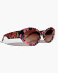 JEWELISSA ~ Oval shaped sunglasses in tortoiseshell acetate sprinkled with vibrant pink hearts