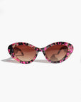JEWELISSA ~ Oval shaped sunglasses in tortoiseshell acetate sprinkled with vibrant pink hearts
