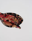 JEWELISSA ~ Oval shaped sunglasses in tortoiseshell acetate sprinkled with vibrant pink hearts