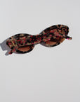 JEWELISSA ~ Oval shaped sunglasses in tortoiseshell acetate sprinkled with vibrant pink hearts