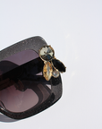LIQUORICH ~ Oversized rounded square sunglasses in luminous black glitter acetate with crystal embellishments