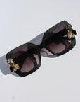 LIQUORICH ~ Oversized rounded square sunglasses in luminous black glitter acetate with crystal embellishments