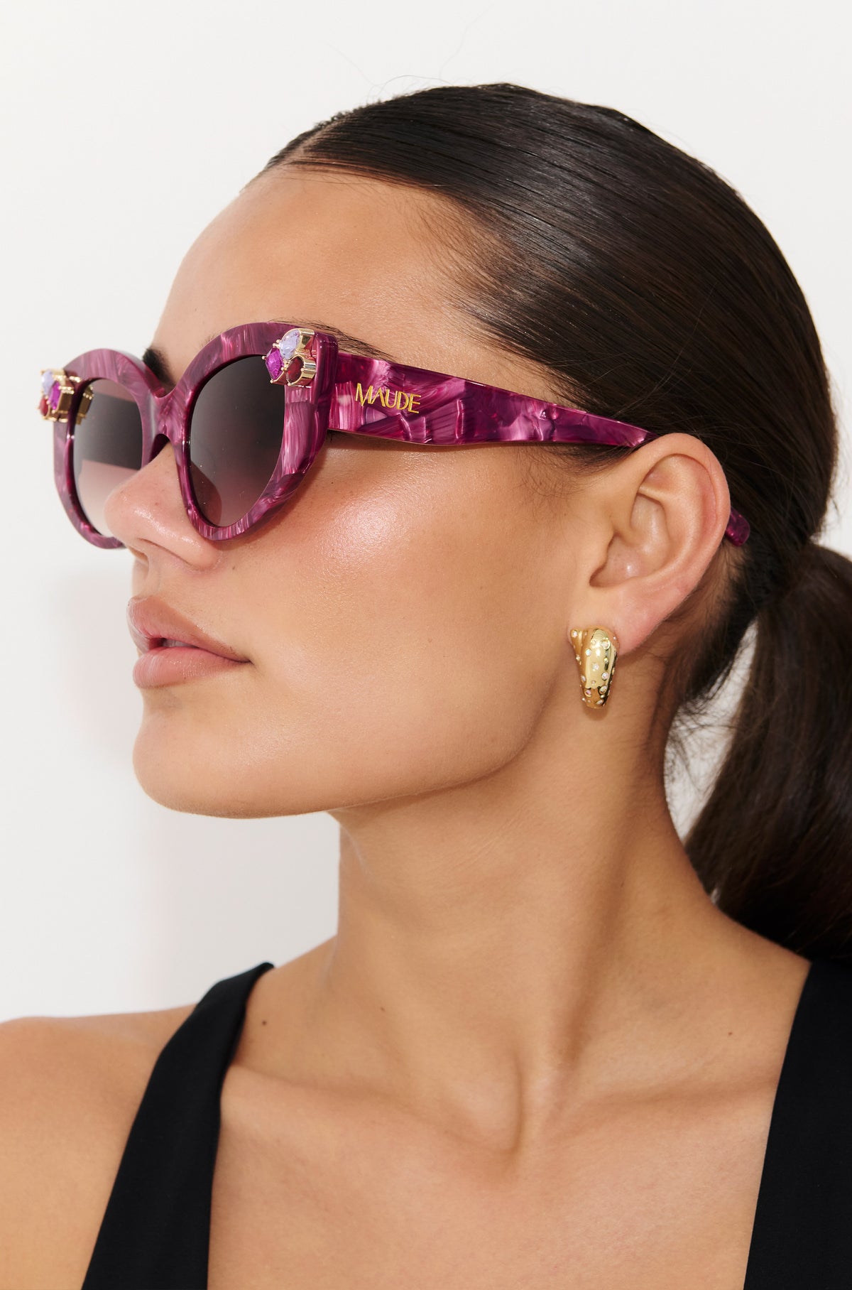 RUBEYE ~ Modern cateye sunglasses in a radiant marbled crimson acetate with crystal embellishments