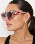 CALYPSO ~ Modern cateye sunglasses in a vibrant multicoloured acetate with crystal embellishments