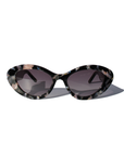 ONYX NOIR ~ Oval shaped sunglasses in marbled black and blush with shimmering turquoise acetate