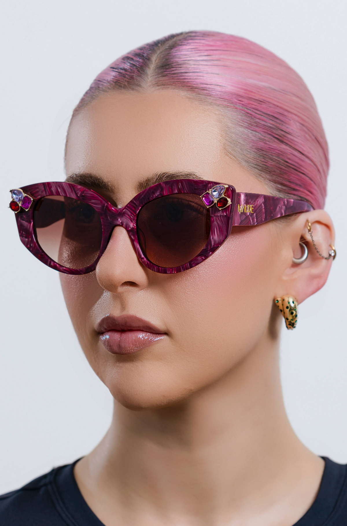 RUBEYE ~ Modern cateye sunglasses in a radiant marbled crimson acetate with crystal embellishments