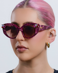 RUBEYE ~ Modern cateye sunglasses in a radiant marbled crimson acetate with crystal embellishments