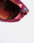 RUBEYE ~ Modern cateye sunglasses in a radiant marbled crimson acetate with crystal embellishments