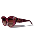 RUBEYE ~ Modern cateye sunglasses in a radiant marbled crimson acetate with crystal embellishments