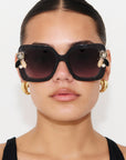 LIQUORICH ~ Oversized rounded square sunglasses in luminous black glitter acetate with crystal embellishments