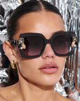 LIQUORICH ~ Oversized rounded square sunglasses in luminous black glitter acetate with crystal embellishments