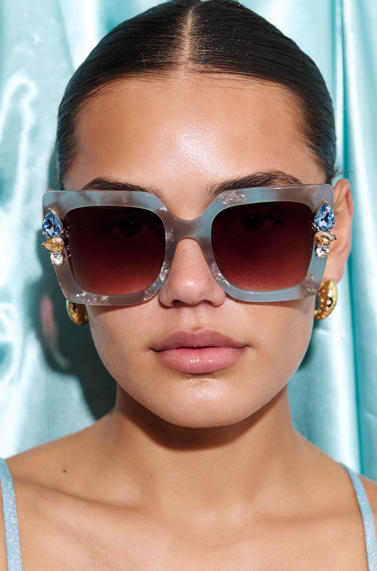 SKYSHINE ~ Oversized square sunglasses in a pale blue and shimmering apricot acetate with statement crystal embellishments