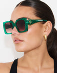 EMMARALDA ~ Square shaped sunglasses in shimmering glitter emerald green acetate