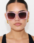 GLITTERATI ~ Square shaped sunglasses in silver glitter with a confetti of pink hearts and peach sequins