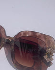 Aftersun ~ Medium sized square sunglasses in brown acetate with golden shimmer and bold crystal flower details