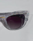 Chandalie ~ Sharp two-tone cat-eye sunglasses in iridescent glitter and silver sparkle acetate