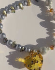 STARGLOW ~ Handmade yellow crystal heart necklace with reflective beads, crystal-rondelle-beads-and-sea-green-natural-pearls