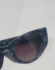 Saphira ~ Almond-shaped sunglasses in marbled blue shimmer acetate
