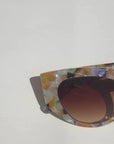 Confetti ~ Almond-shaped fitted sunglasses in multi-coloured patterned acetate