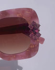 Sunrose ~ Medium sized square sunglasses in rose acetate with flecks of gold and crystal flower embellishments