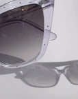 Stardust ~ Sharp cat-eye sunglasses in clear shimmer with micro white crystal detailing