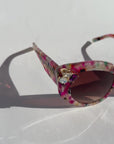 CALYPSO ~ Modern cateye sunglasses in a vibrant multicoloured acetate with crystal embellishments
