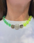 NEON DARLING ~ Handmade necklace with fluoro faceted beads with small pearls and emerald green beads and a crystal centrepiece