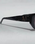 Black Pearl ~ Black almond-shaped acetate sunglasses with subtle dark shimmer